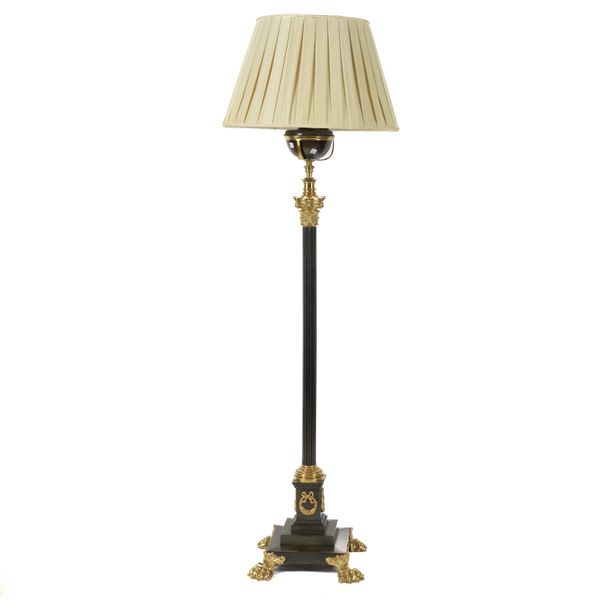 A GILT AND PATINATED BRASS TELESCOPIC CORINTHIAN COLUMN FLOOR STANDING LAMP