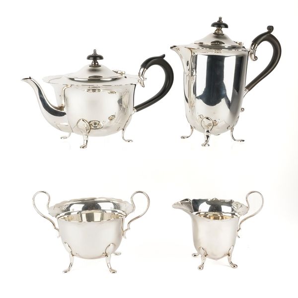 A SILVER AND PLATED MATCHED FOUR PIECE TEA SET (4)