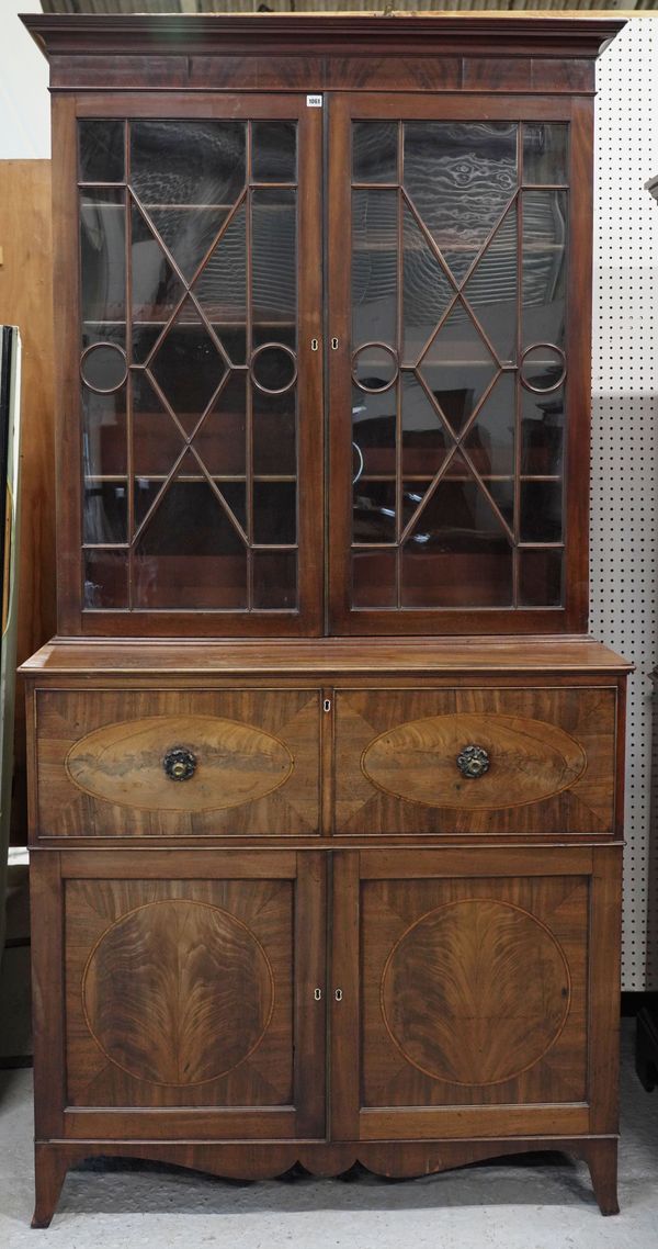 A GEORGE III MAHOGANY ASTRAGAL GLAZED SECRETAIRE BOOKCASE