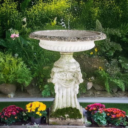 A RECONSTITUTED STONE SHALLOW JARDINIERE