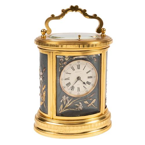 A RARE FRENCH OVAL STRIKING AND REPEATING CARRIAGE CLOCK WITH THREE SHIBAYAMA STYLE PANELS