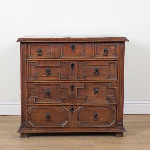A CHARLES II OAK CHEST OF DRAWERS