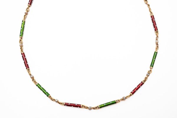 A GOLD, GREEN AND RED ENAMELLED AND SEED PEARL NECKCHAIN