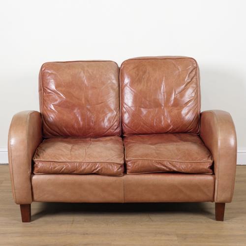 BRIGHTS OF NETTLEBED; AN ART DECO STYLE TAN LEATHER UPHOLSTERED THREE PIECE SUITE (3)