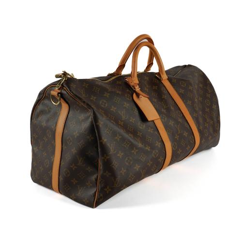 LOUIS VUITTON: A MONOGRAM LEATHER LUGGAGE HOLDALL BAG