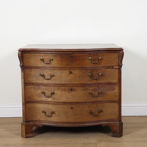 AN 18TH CENTURY MAHOGANY SERPENTINE FOUR DRAWER CHEST