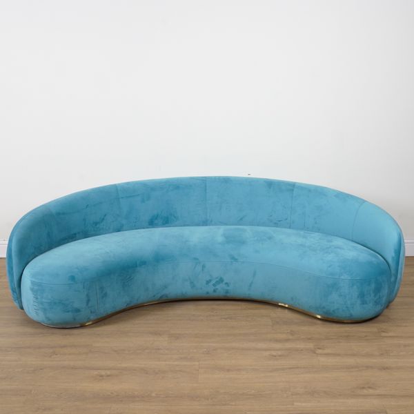 A MODERN CONCAVE BLUE UPHOLSTERED SOFA