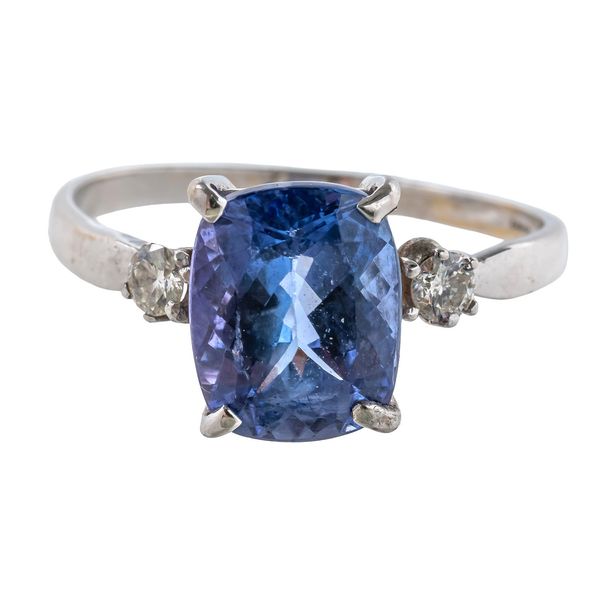 A TANZANITE AND DIAMOND RING