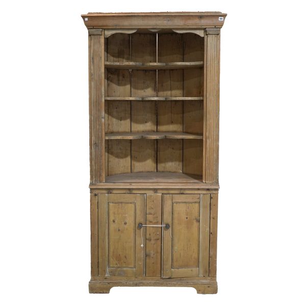 AN 18TH CENTURY AND LATER PINE FLOORSTANDING CORNER CUPBOARD