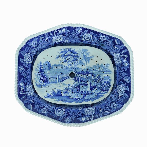 A LARGE RIDGWAYS BLUE AND WHITE PRINTED EARTHENWARE SHAPED OVAL MEAT DISH (2)