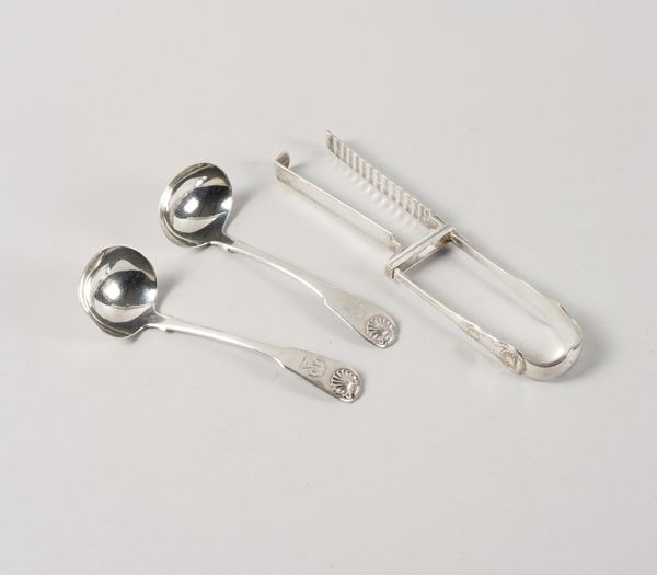 A PAIR OF SILVER ASPARAGUS SERVING TONGS AND A PAIR OF SCOTTISH SILVER SAUCE LADLES (3)