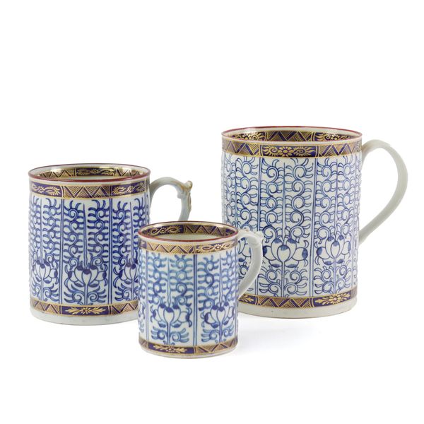 THREE WORCESTER CYLINDRICAL MUGS IN THE `ROYAL LILY' PATTERN (3)