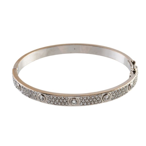 A DIAMOND SET HINGED BANGLE