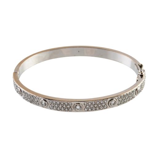 A DIAMOND SET HINGED BANGLE