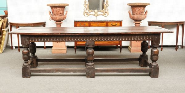 A 17TH CENTURY AND LATER OAK REFECTORY TABLE ON SIX TURNED SUPPORTS