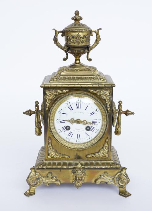A FRENCH GILT-BRASS MANTEL CLOCK