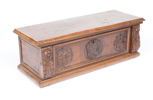 A 17TH CENTURY ITALIAN CARVED WALNUT COFFER
