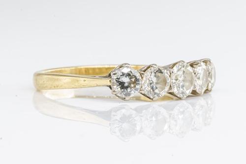 A DIAMOND FIVE STONE RING