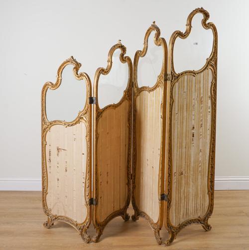 AN EARLY 20TH CENTURY FRENCH ROCOCO REVIVAL GILT FRAMED FOUR FOLD SCREEN