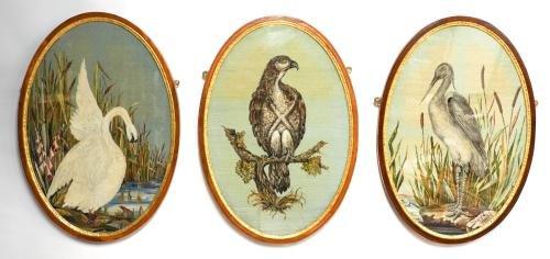 A SET OF THREE VICTORIAN WOOL EMBROIDERED PANELS OF BIRDS (3)