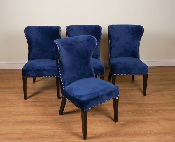 A SET OF FOUR NAVY BLUE VELVET UPHOLSTERED WINGBACK CHAIRS (4)