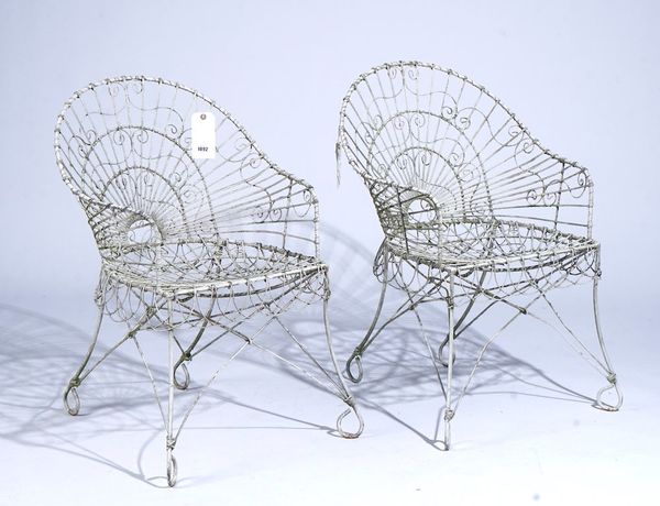 A PAIR  OF 20TH CENTURY WHITE PAINTED WIRE-WORK ‘PEACOCK’ TUB CHAIRS