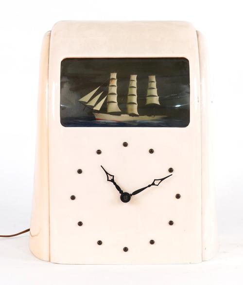 VITASCO-E, A MID 20TH CENTURY CREAM BAKELITE 'SEA SHIP' MANTEL CLOCK