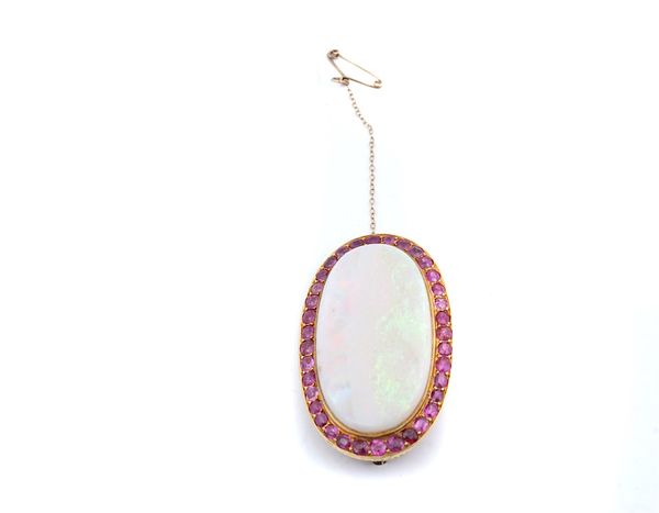 A FRENCH 18CT GOLD AND RUBY SET OPAL BROOCH