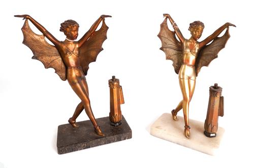 A NEAR PAIR OF GILT-METAL FIGURAL TABLE LIGHTERS, MODELLED AS FOLIES BERGERES ‘BAT DANCERS’ (2)