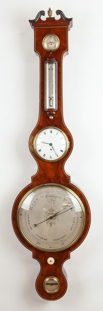 A RARE REGENCY WHEEL BAROMETER WITH TIMEPIECE