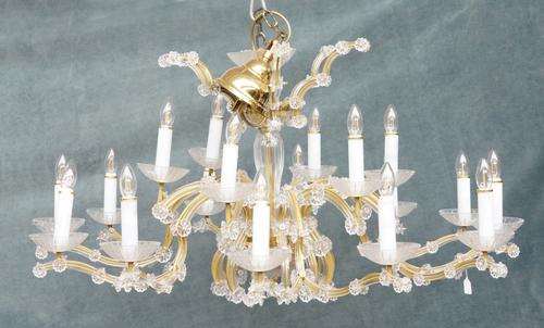 PROBABLY SWAROVSKI: A LARGE CUT GLASS EIGHTEEN BRANCH CHANDELIER
