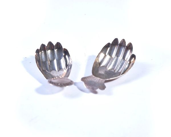 TWO SILVER CADDY SPOONS FORMED AS HANDS (2)