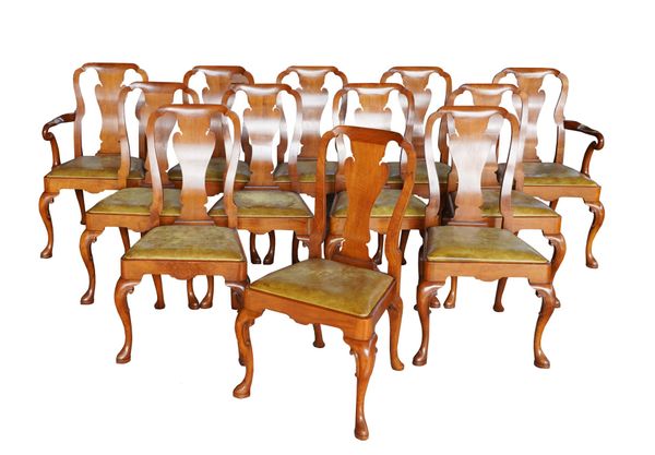 A SET OF TWELVE WALNUT FRAMED VASE BACK DINING CHAIRS OF QUEEN ANNE DESIGN (12)