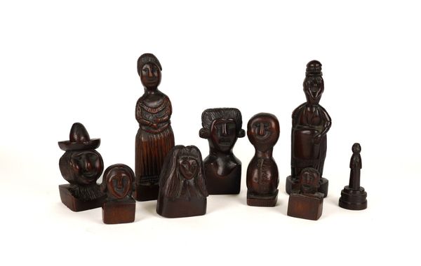 A SET OF NINE CARVED WOOD FOLK ART FIGURES (9)