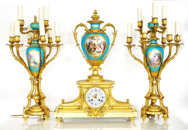 A GOOD FRENCH ORMOLU AND SEVRES STYLE CLOCK GARNITURE