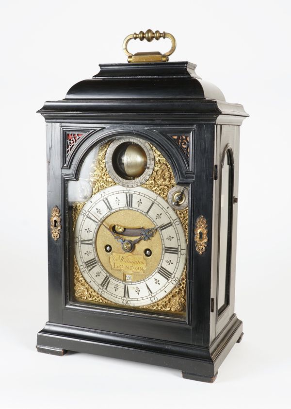 A RARE AND UNUSUAL GEORGE I EBONY STRIKING BRACKET CLOCK WITH REVOLVING SPHERICAL MOON PHASE AND AGE OF THE MOON INDICATION