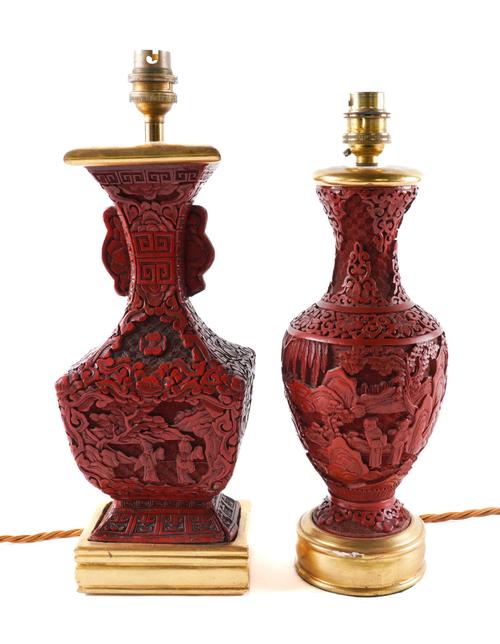 TWO CHINESE CINNABAR LACQUER RELIEF CARVED BALUSTER TABLE LAMPS (2)