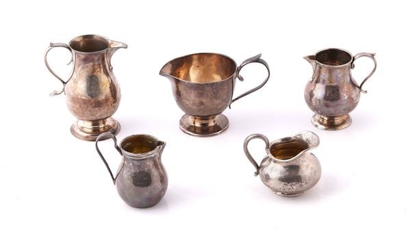 FIVE MOSTLY SILVER AND FOREIGN CREAM JUGS (5)