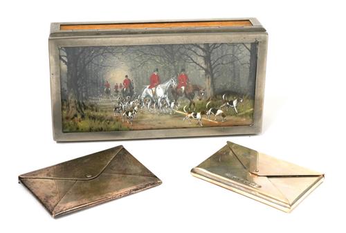 TWO SILVER VISITING CARD CASES AND A PLATED TABLE CIGARETTE BOX WITH A HUNTING SCENE VIEW (3)