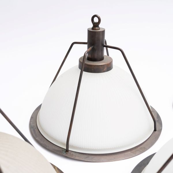 A SET OF FOUR FROSTED GLASS AND COPPER INDUSTRIAL PENDANT CEILING LIGHTS (4)