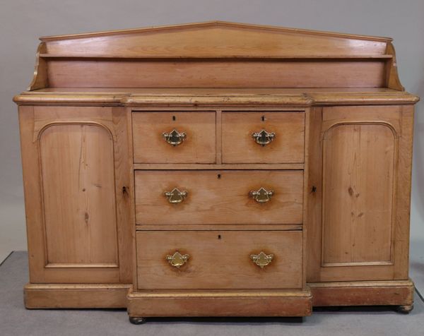 A Victorian pine breakfront sideboard