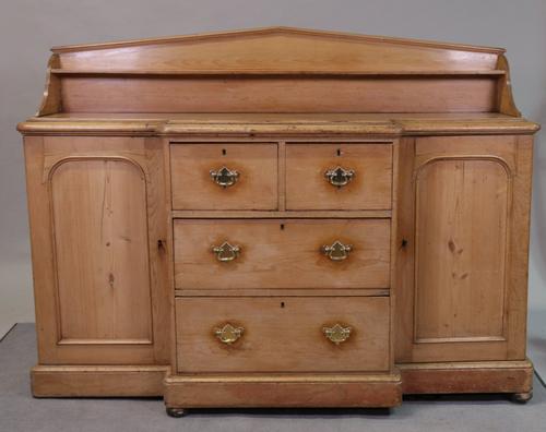 A Victorian pine breakfront sideboard