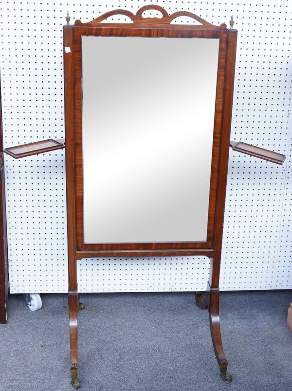 A GEORGE III MAHOGANY HEIGHT ADJUSTABLE CHEVAL MIRROR