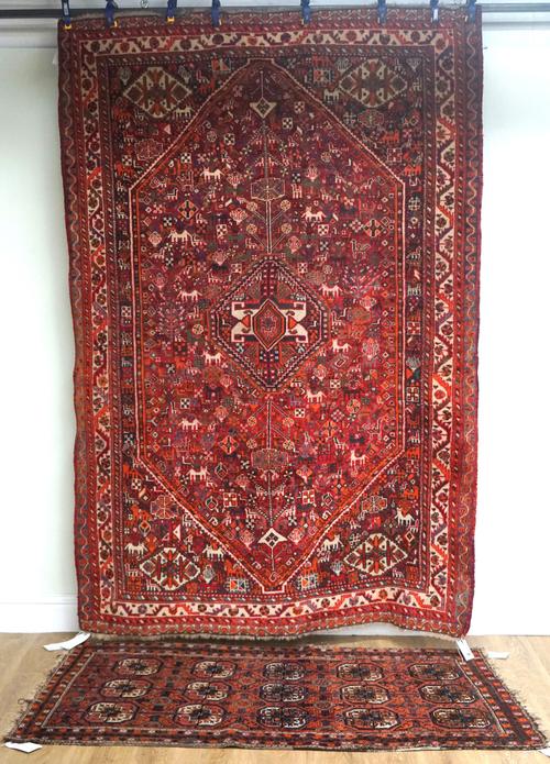 A GHASGHAI RUG, SOUTH PERSIAN, AND A BOKHARA RUG (2)