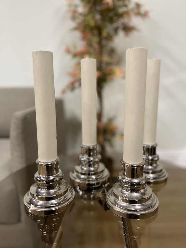 FOUR SILVERED METAL LAMP BASES WITH ELECTRIC CANDLE FITTINGS (4)