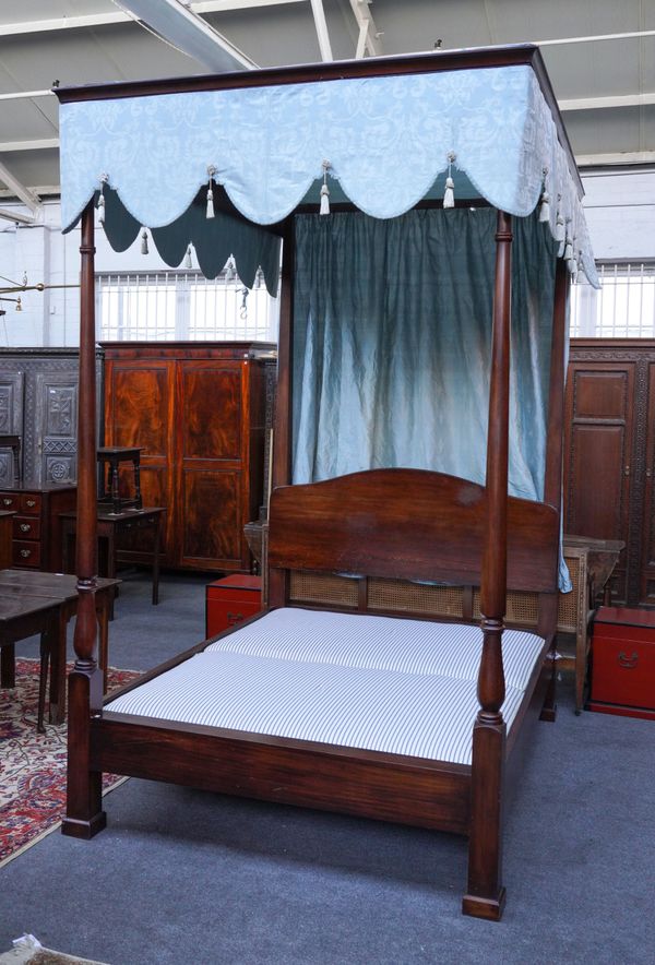 A MODERN MAHOGANY FOUR POSTER BED WITH TURNED FOOT COLUMNS