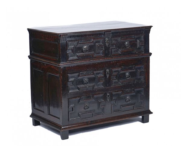 A CHARLES II WALNUT TWO PART CHEST AND LATER