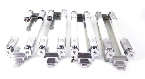 A SET OF FOUR ART DECO CHROME PLATED WALL APPLIQUES (4)