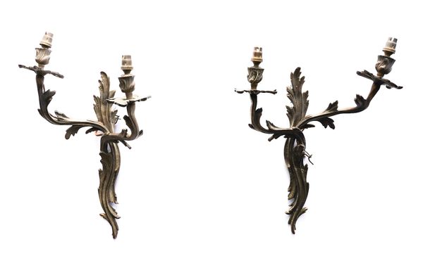 A PAIR OF LOUIS XV STYLE GILT-BRONZE TWIN LIGHT WALL APPLIQUES (5)