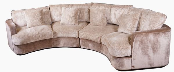 A CONCAVE VELVET LEOPARD PRINT UPHOLSTERED SOFA